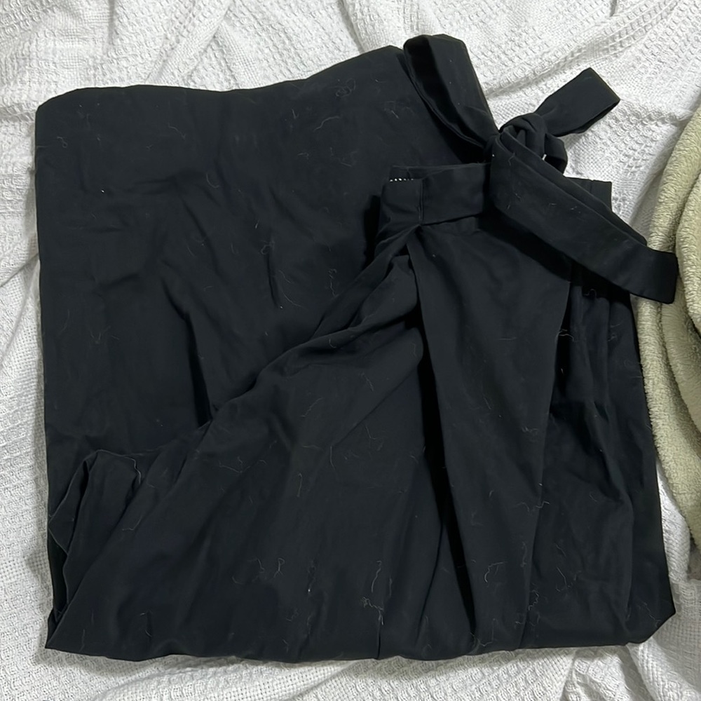 Black wide leg dress pants with a side tie